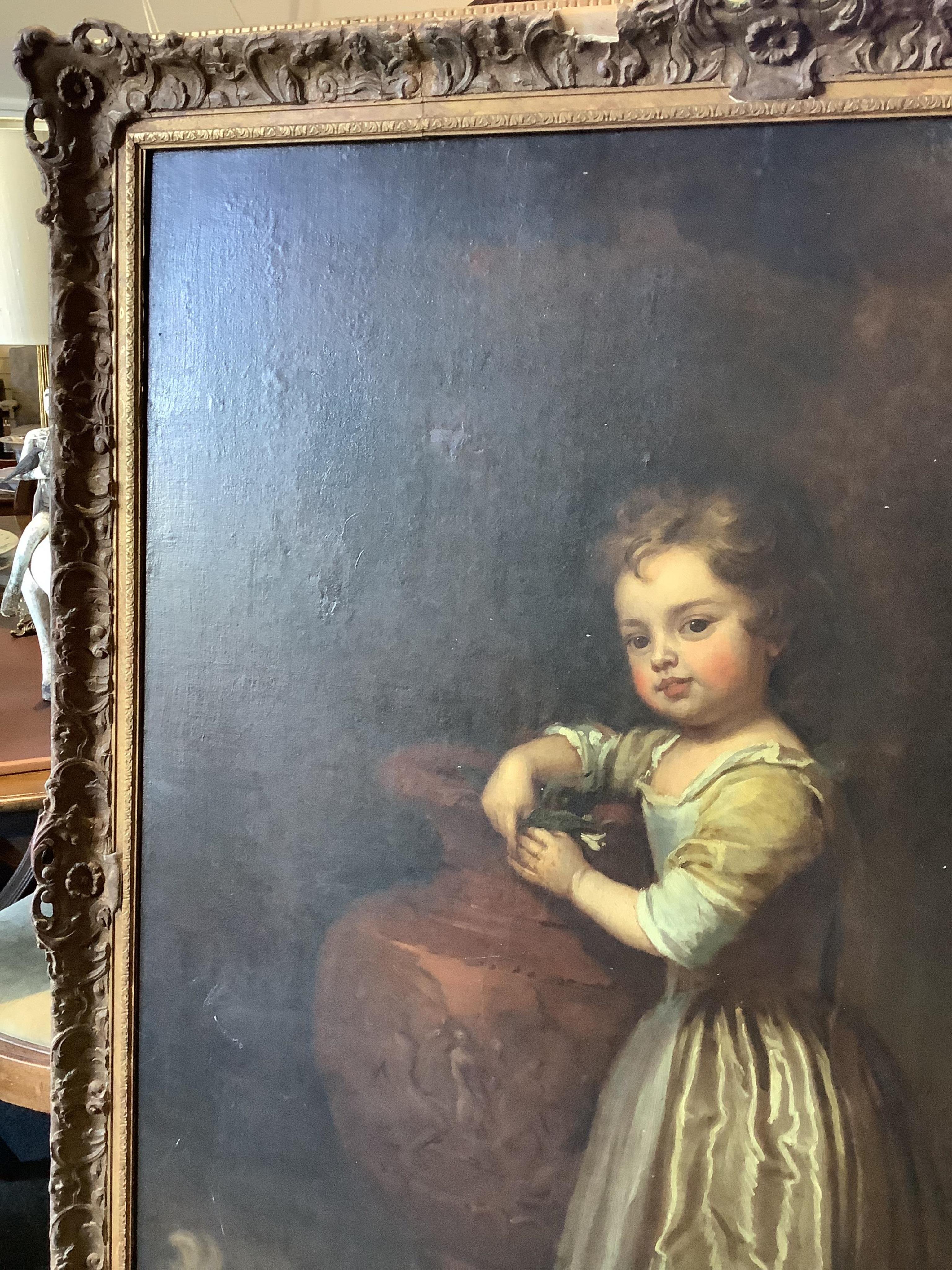 Studio of Sir Godfrey Kneller (1646-1723), Portrait of a child standing full length beside a classical urn, a small dog at her feet, oil on canvas, 126 x 101cm